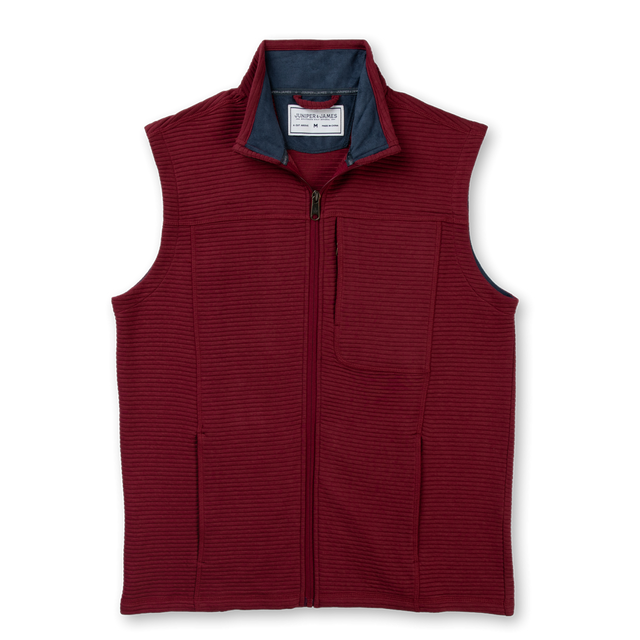 A sleeveless zip-front vest in deep burgundy with a stand collar, shown flat against a solid white background.