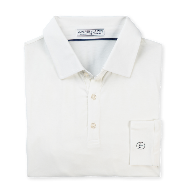 A folded white polo shirt with a pointed collar, two-button placket, and a left chest pocket featuring a circular embroidered logo, shown on a plain white background.