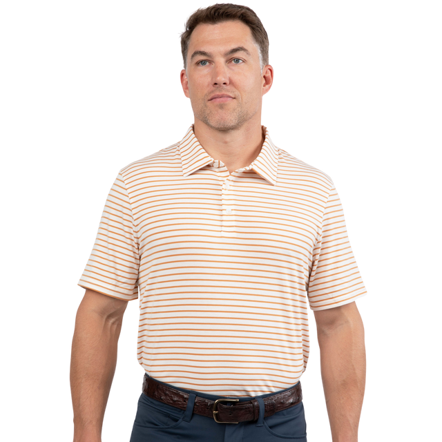 Man wearing a beige and orange striped polo shirt on a white background