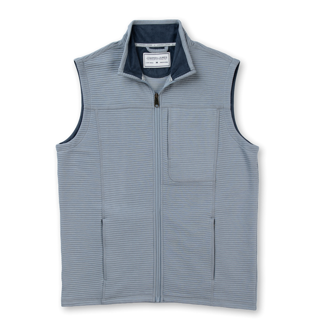 A sleeveless zip-front vest in a light blue-gray color with subtle vertical texture, featuring a stand collar, a front chest pocket, and two vertical front hand pockets, shown on a plain white background.